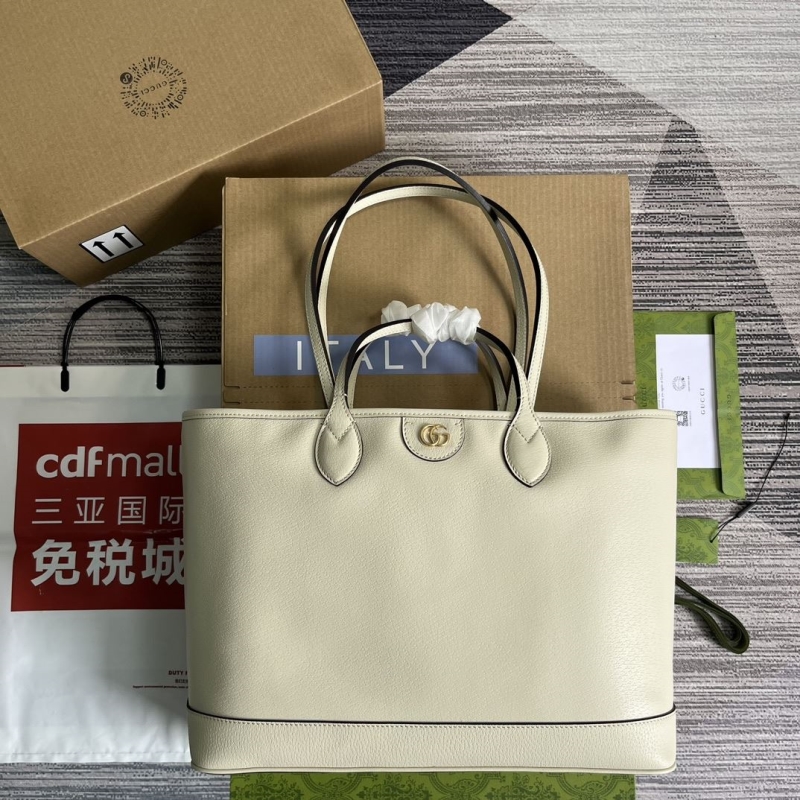 G*u*i shopping bags